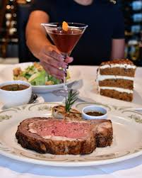 The Palm signature dishes Prime Rib, Lobster Bisque, Chicken Parmesan 